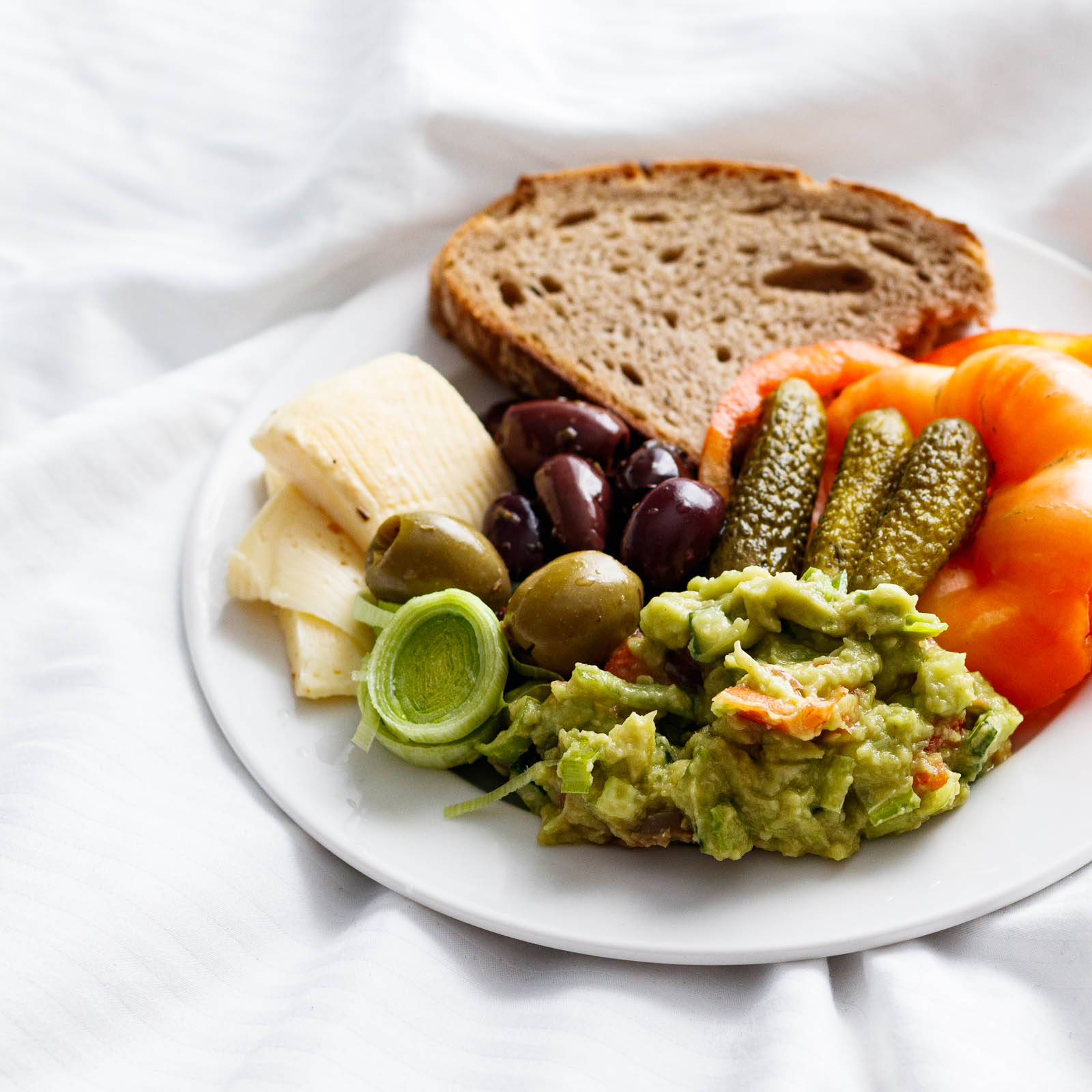 Plate with Easy Vegetarian Breakfast on a white background
