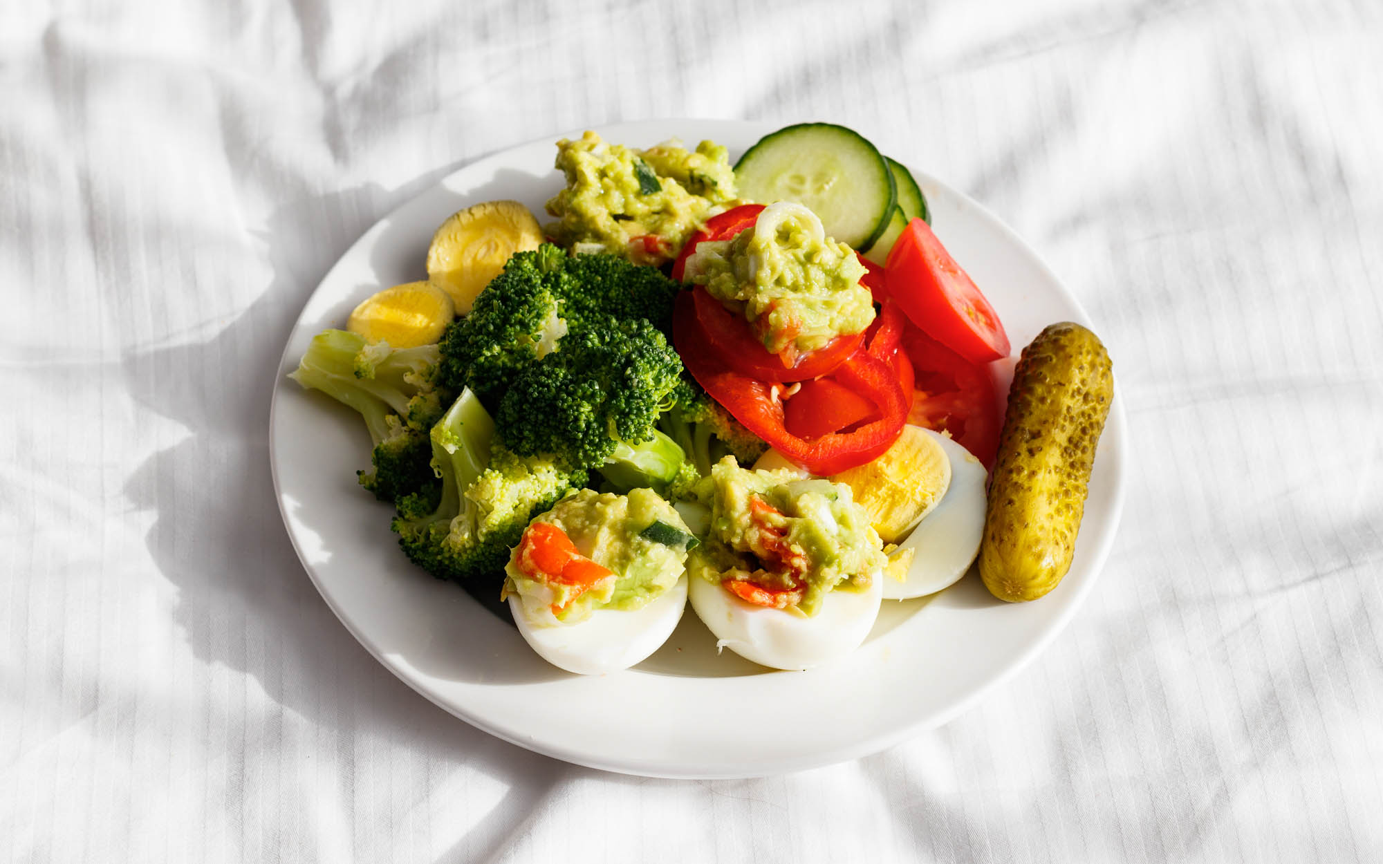 Messy Avocado Eggs Veggies Plate