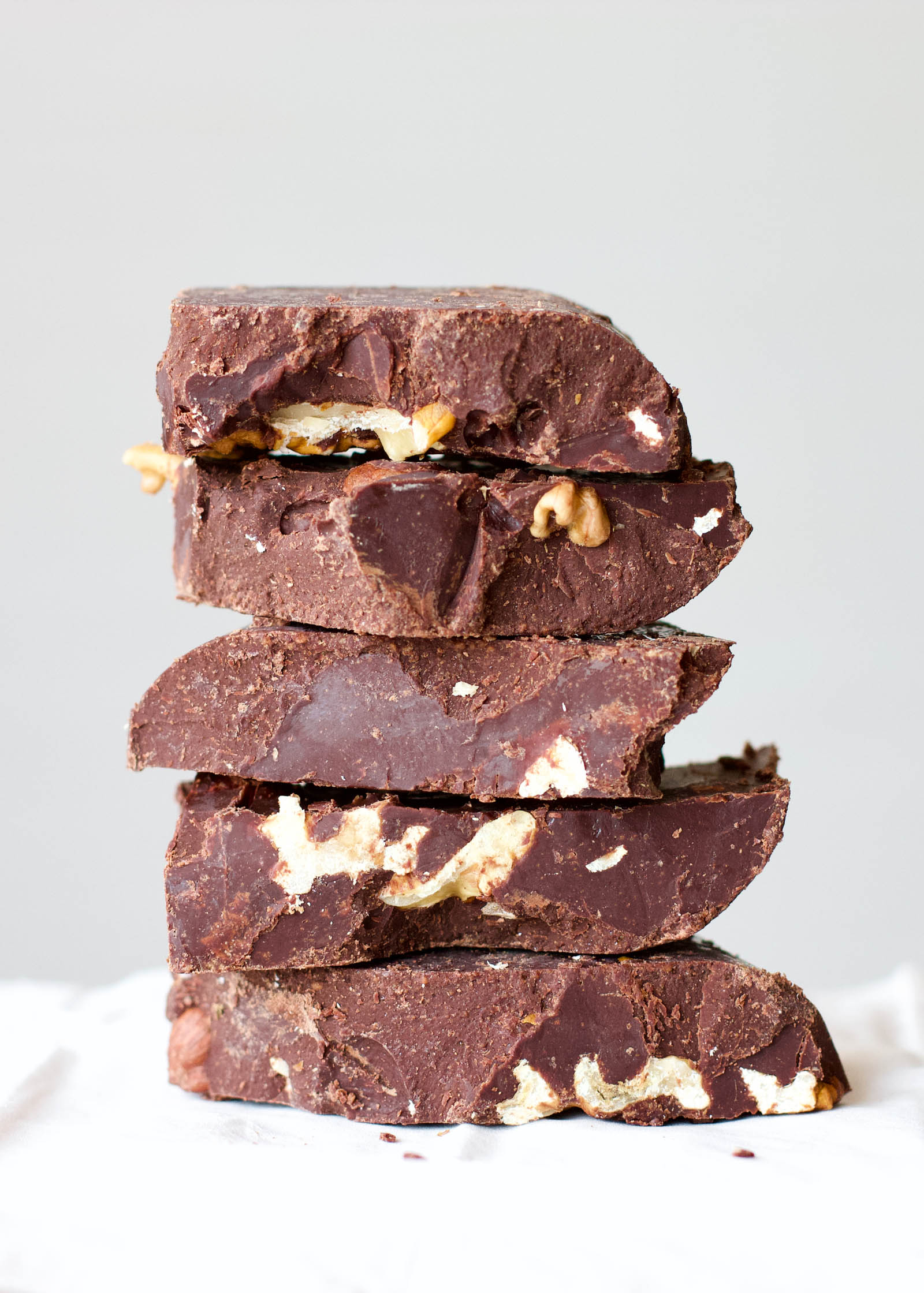 Stacked pieces of Homemade Dark Chocolate with Walnuts