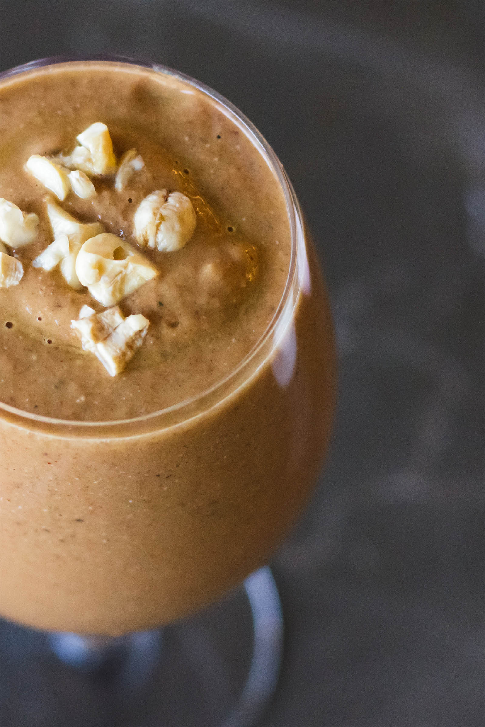 Top-down view with glass of Spices of India Smoothie on a table