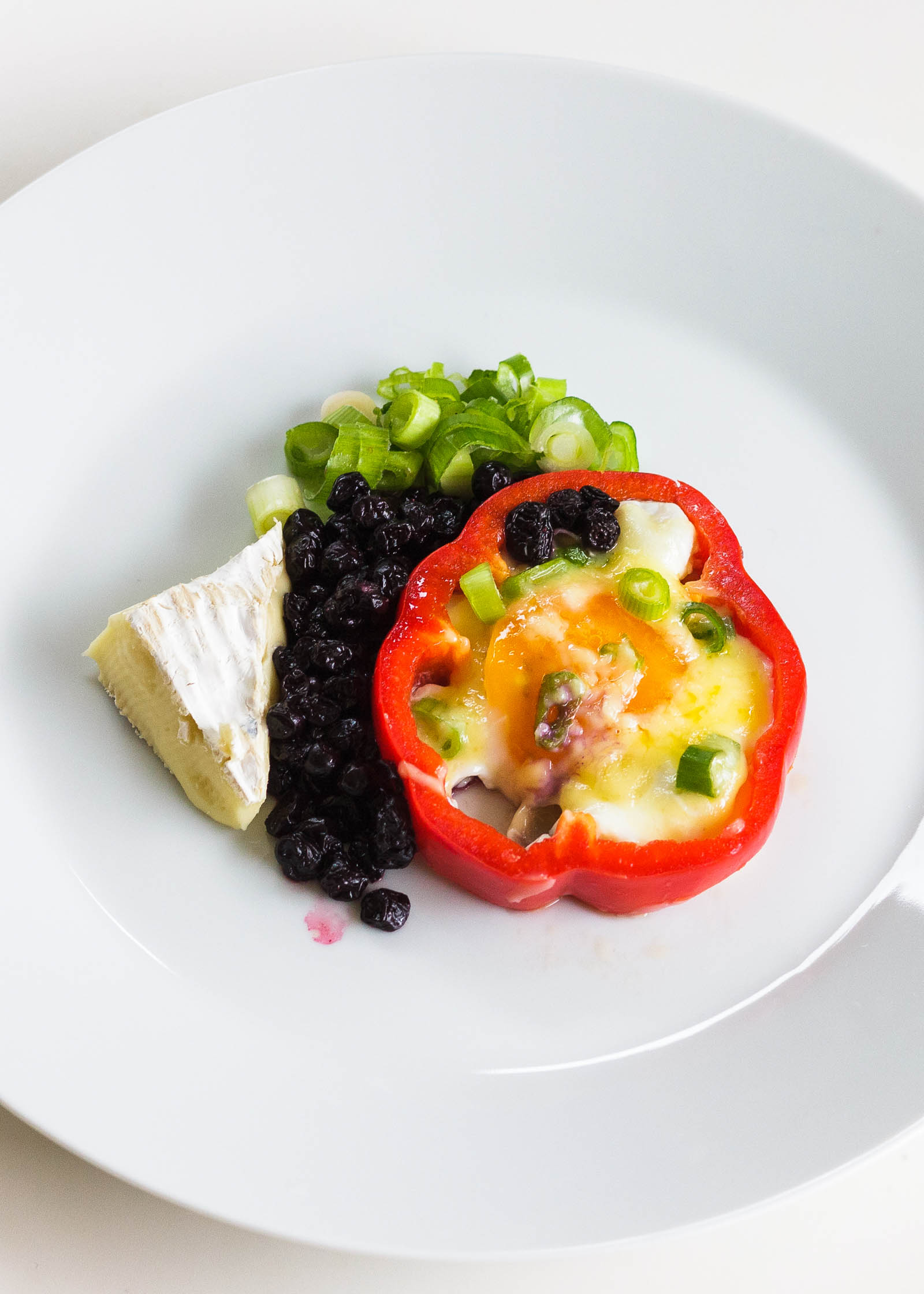 One serving of Bell Pepper Fried Eggs in white plate
